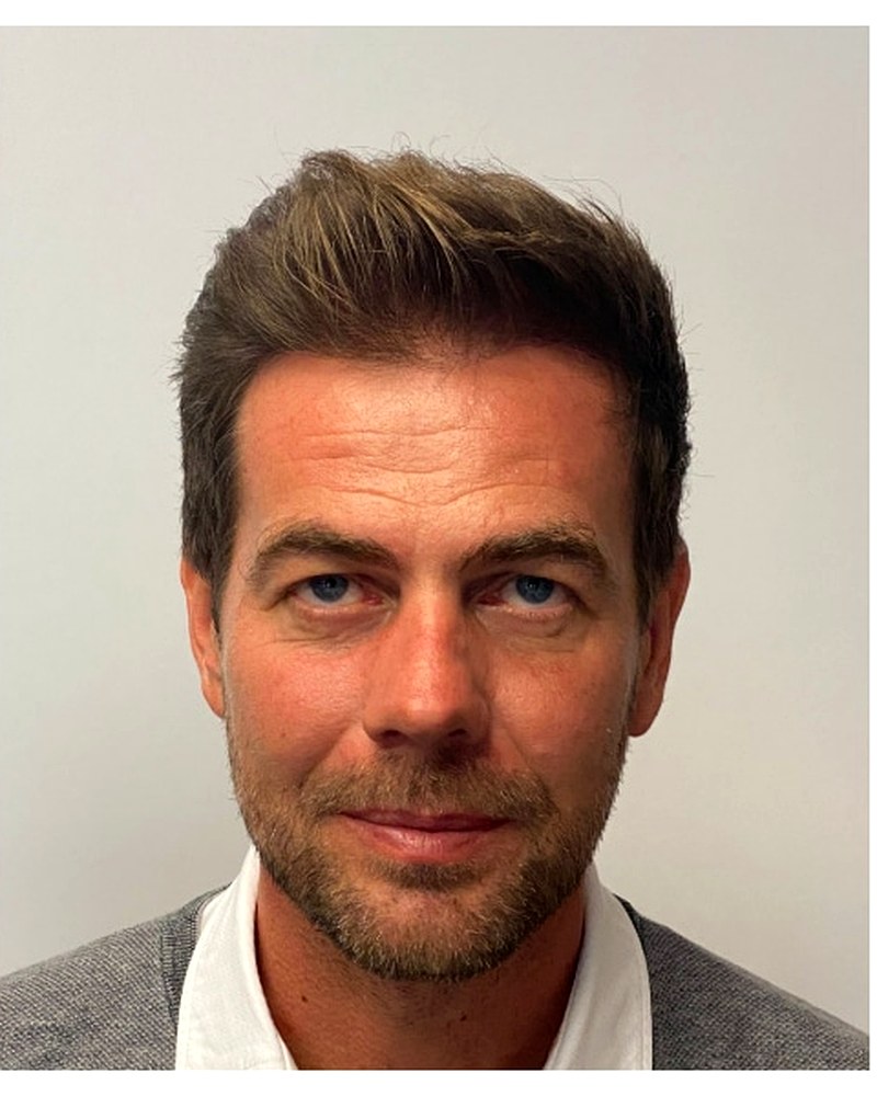 Same man front facing with a full, naturally styled hairline after a LiteStyle Transformation